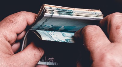 Dependendo da data de pagamento, inflação do período pode corroer rendimento da aplicação (Imagem: Shutterstock)