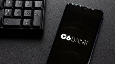 C6 Bank conseguiu decisão judicial para manter oferta do consignado (Imagem: Shutterstock)