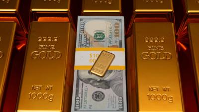 Liquidações em posições vendidas de ouro aceleram o rali do metal precioso (Imagem: Shutterstock)